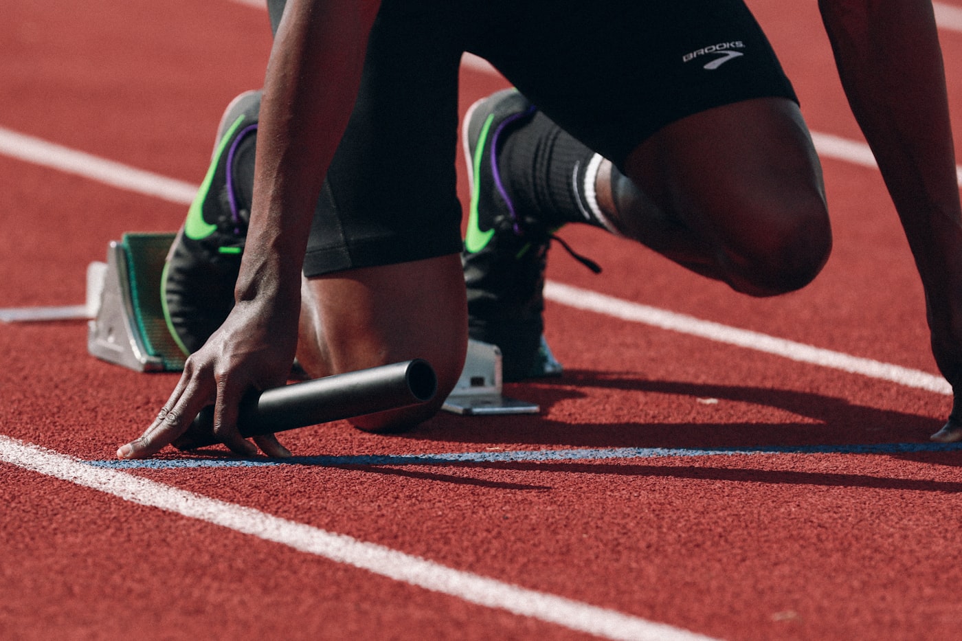 Runner sprinting on an outdoor track