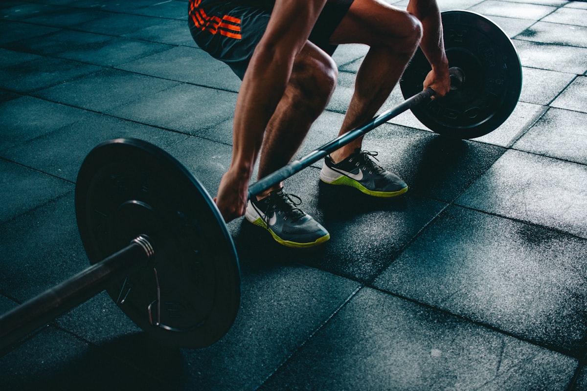 Athlete performing a deadlift with a barbell