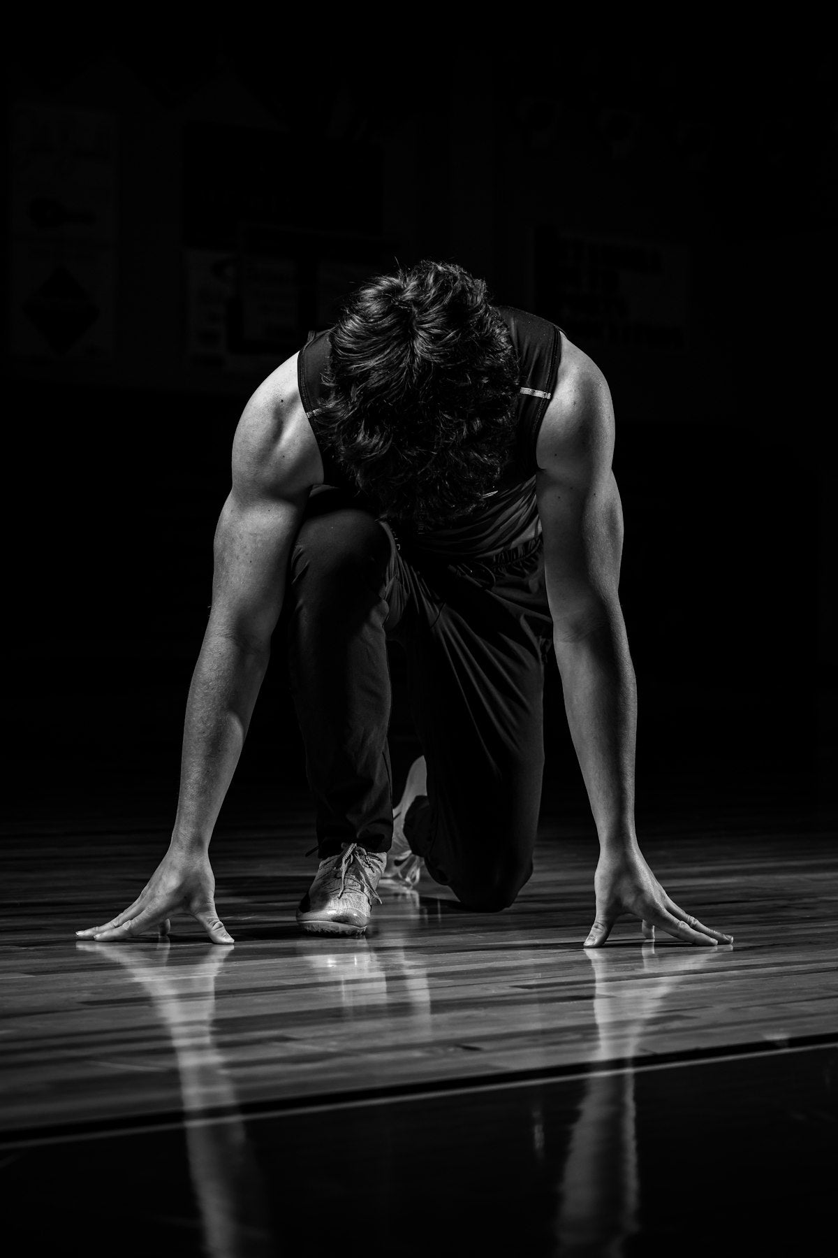 Fit athlete stretching and warming up